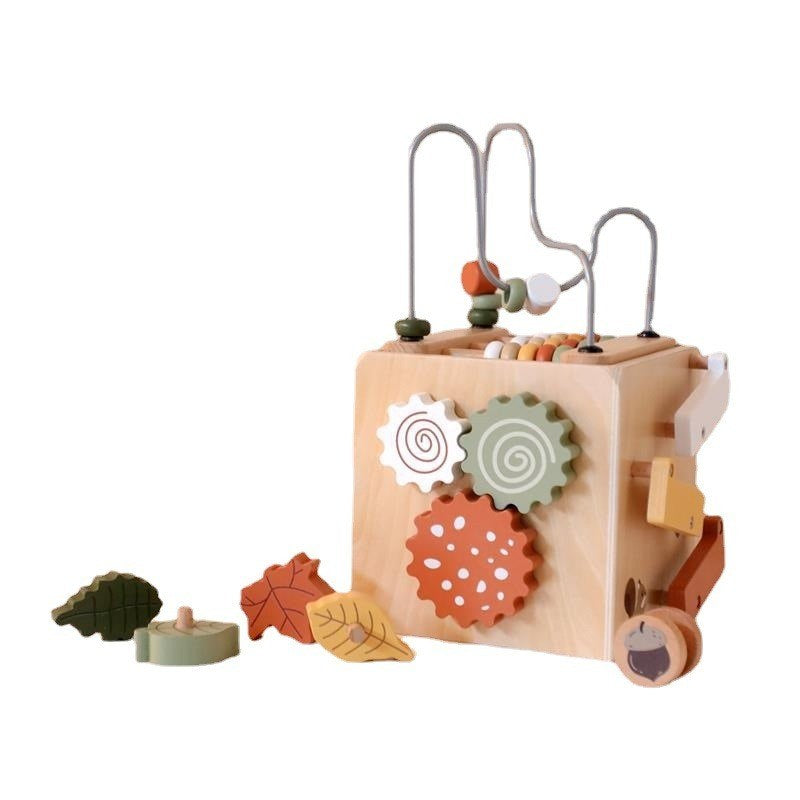 Montessori 5-in-1 wooden activity cube with bead maze, spinning gears and wooden leaf shapes