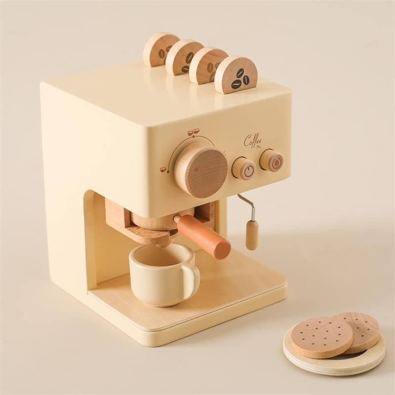 Wooden toy coffee machine with portafilter, cup and coffee pods in the top slot